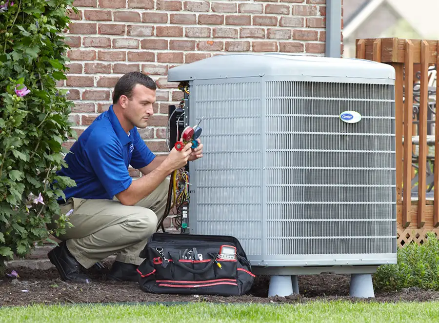 HVAC technician inspecting an outdoor AC unit in San Francisco